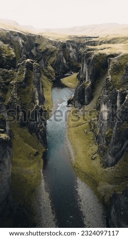 This awesome image features Fjaorargljufur in Iceland, a jaw-dropping canyon carved by a rushing river over thousands of years.