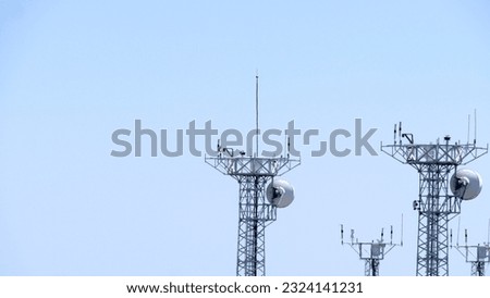 Two antennas on a communications tower
