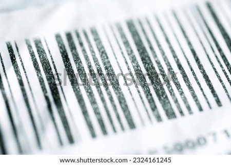 Close up of a barcode printed on brown cardboard