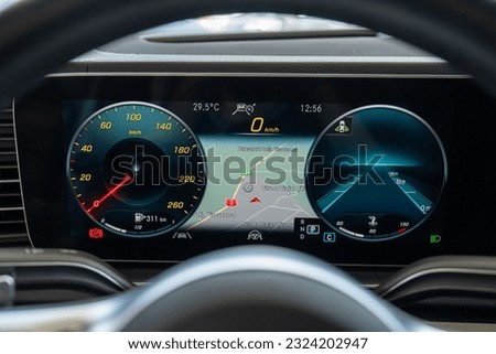 car dashboard with speedometer steering wheel 
