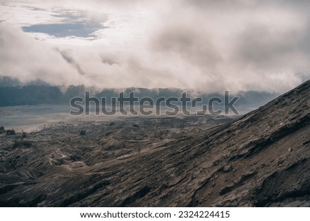 Landscape view of Bromo mount crater in fog. Semeru National Park in Indonesia volcanic reservation