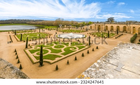 Orangery Garden at the crossroads of several groves in the Gardens of Versailles, Chateau Versailles near Paris, France. Royalty-Free Stock Photo #2324247641