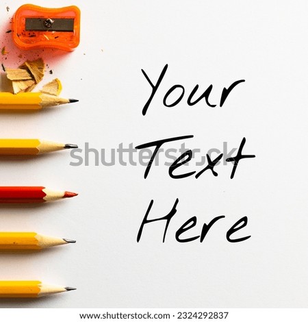 Holding text space with pencils and pencil sharpener on white background. Social media creativity, school, education, work, ideas story background template concept digitally generated image.