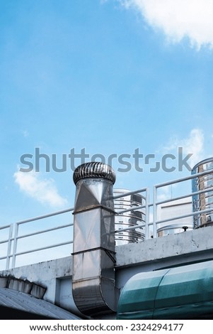 Stainless steel water tank on the roof of the building.