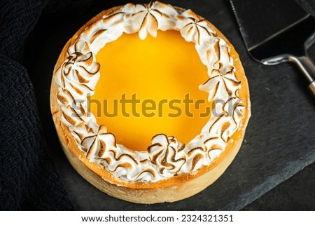 Lemon Meringue Pie made with shortcrust pastry, lemon curd, and torched Italian meringue.