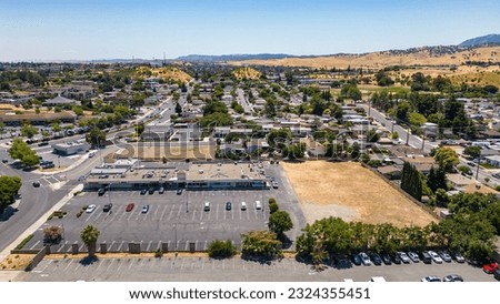 Antioch, California USA June 28, 2023: Aerial images over a commercial property with a vacant field