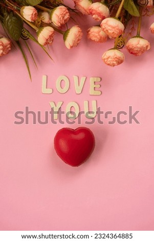 Romantic poster image, Red heart shape with flowers and love you letter on a light pink colour background