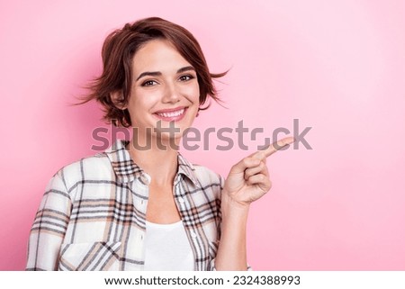 Portrait of young business lady wear stylish shirt indicating finger empty space offer discount promo isolated on pink color background