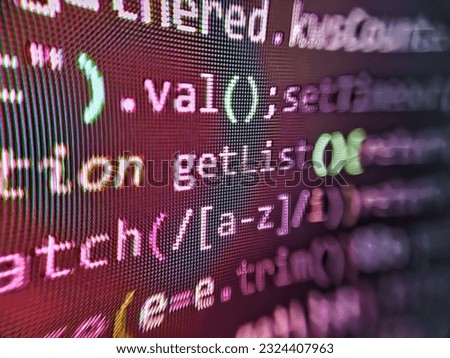 Application web source code on monitor. Code language on a computer screen with a shallow depth of field. Focus point on the decrypted word. CSS, JavaScript and H