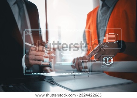 Industrial Manufacturing: Multiracial Technical Engineer Learning with Robot Arm Machine in a Factory Setting Royalty-Free Stock Photo #2324422665