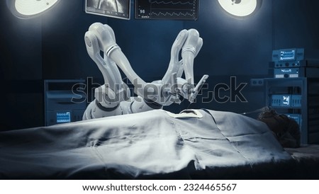Modern Hospital: Surgery Patient Laying On Surgical Table While Robot Arms Performing High-Precision Nanosurgery. Automated Programmable Robotic Limbs Working On Heart Transplant On Person. Royalty-Free Stock Photo #2324465567
