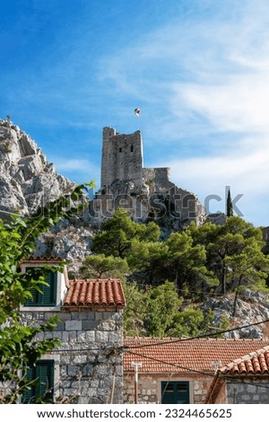 Mirabella Pirate Fortress on top of a mountain in Omis, Croatia Royalty-Free Stock Photo #2324465625