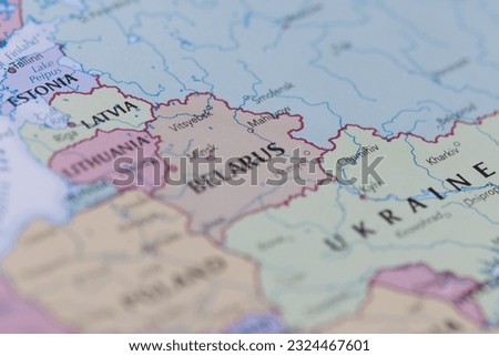 Belarusian,  Ukrainian and Russian borders in focus on political map.  Royalty-Free Stock Photo #2324467601