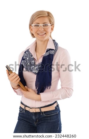 Happy businesswoman holding folder, smiling, looking at camera.