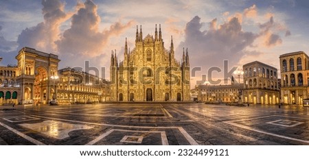 Panoramic view of Piazza del Duomo square with Milan Cathedral, Duomo di Milano, and Galleria Vittorio Emanuele II, Italy, on sunrise. Milan Cathedral is one of the largest churches in the world. Royalty-Free Stock Photo #2324499121