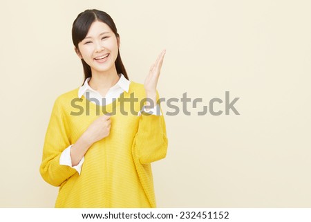 Japanese woman pointing side