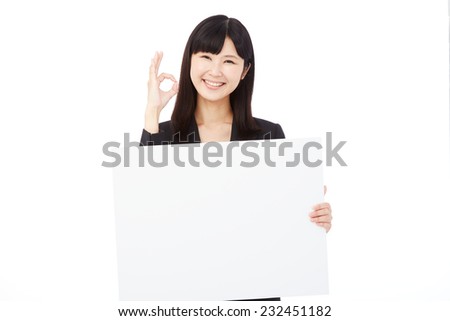 smiling Japanese businesswoman with Bulletin Board