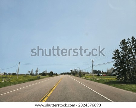An open highway on a clear spring day.