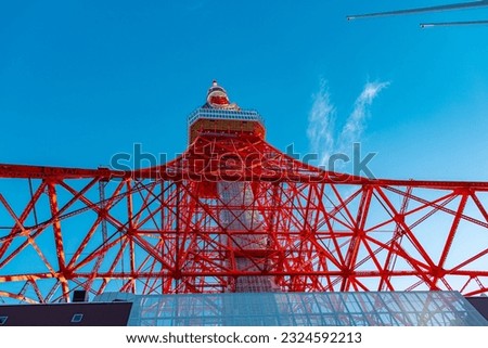 The beautiful scenery of Tokyo Tower in blue sky. This is a famous landmark in Tokyo, Japan.
