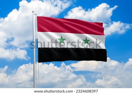 Syria national flag waving in the wind on clouds sky. High quality fabric. International relations concept