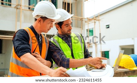 Civil engineers team with safety hard hat working together at construction site outdoor, Construction workers checking and controlling project on building site, Architecture engineering on new project