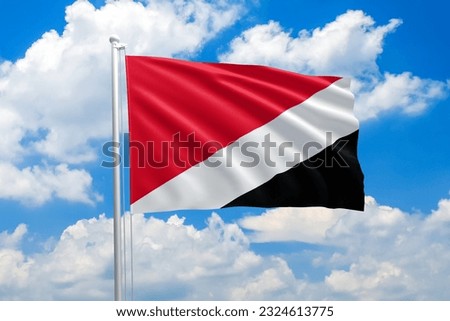 Sealand national flag waving in the wind on clouds sky. High quality fabric. International relations concept