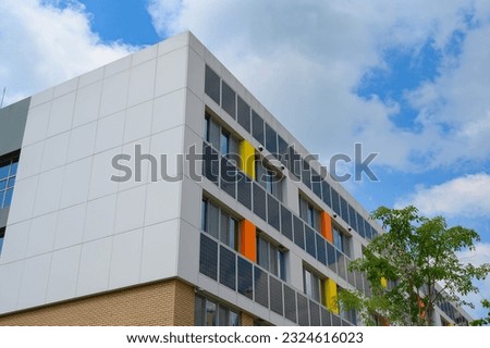 Building solar panels. Solar elementary school building. Eco-friendly school building.
Solar panel on the wall of the building. Royalty-Free Stock Photo #2324616023