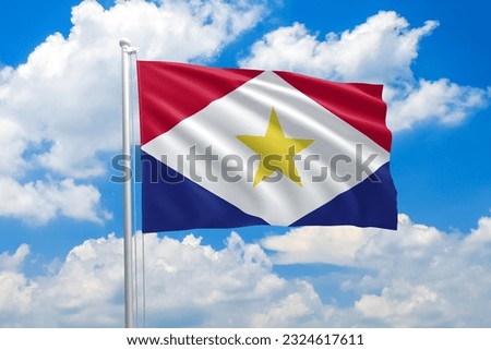 Saba national flag waving in the wind on clouds sky. High quality fabric. International relations concept