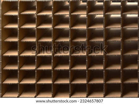 Cardboard packaging. Cellular structure made of cardboard. Interesting pattern and background.