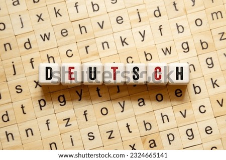 Deutsch - word concept on building blocks, text, letters