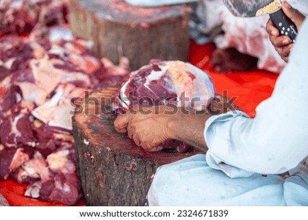 Muslims Eid Ul Azha Qurbani qasai doing meat pieces. Meat Cuttings Style in Pakistan, 