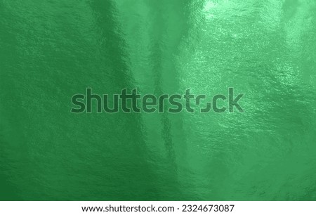 Green foil background with highlights and uneven texture Royalty-Free Stock Photo #2324673087