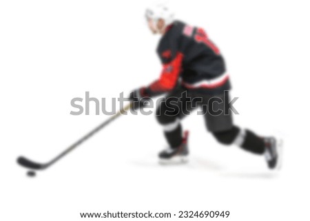 Hockey player on a white background in defocus - backdrop hockey theme - blurred background image