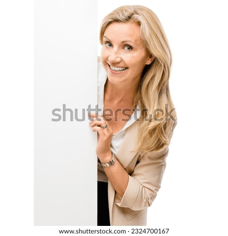 Happy woman, portrait and billboard for advertising on mockup space isolated on a white studio background. Female person or employee with paper, sign or poster in marketing, branding or advertisement