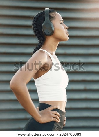 Headphones, tired woman or runner thinking of training, workout or exercise goal on break in city. Relax, resting or thoughtful sports girl athlete streaming radio music or fitness podcast to relax