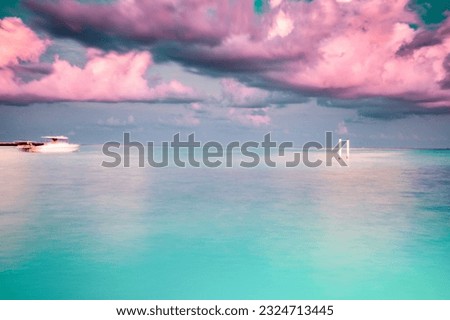 amazing landscape with turquoise sea and pink sunset cloud