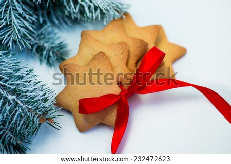christmas hand made cookies star shape with red ribbon