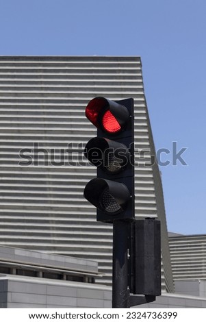 red light traffic light to stop cars in the city
