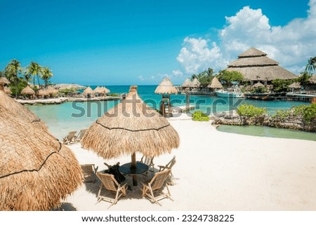 Caribbean beach and lagoon on a sunny day in summertime. Cancun, Mexico. Royalty-Free Stock Photo #2324738225