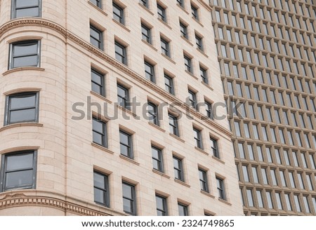 modern building in the heart of the financial district, symbolizing progress and prosperity in the commercial real estate industry. Its large windows represent transparency and sleek design