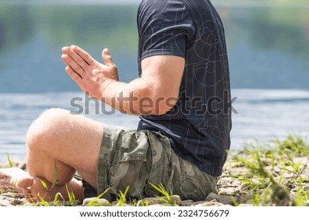Meditation yoga mindfulness by the river soaking in the sun people lifestyles hiking backgrounds copy space