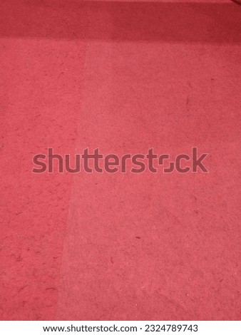 red carpet as background and sign