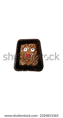 Smile face brownies on white background