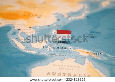 The Flag of Indonesia on the World Map. Royalty-Free Stock Photo #2324819325