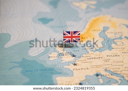 The Flag of United Kingdom on the World Map. Royalty-Free Stock Photo #2324819355