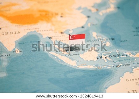 The Flag of Singapore on the World Map. Royalty-Free Stock Photo #2324819413