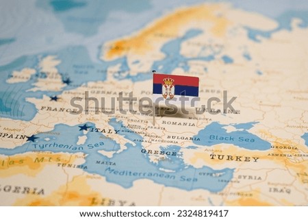 The Flag of Serbia on the World Map. Royalty-Free Stock Photo #2324819417