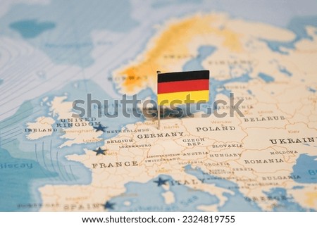 The Flag of Germany on the World Map. Royalty-Free Stock Photo #2324819755