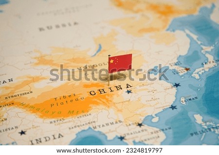 The Flag of China on the World Map. Royalty-Free Stock Photo #2324819797
