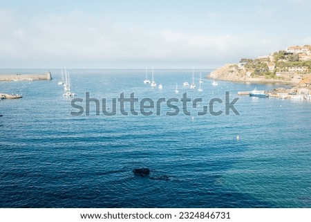 Collioure Bay. Mediterranean coastline. Sailing boats in a bay. Pleasure boats on the sea. Mediterranean. Côte-d'Azur. Languedoc-Roussillon.